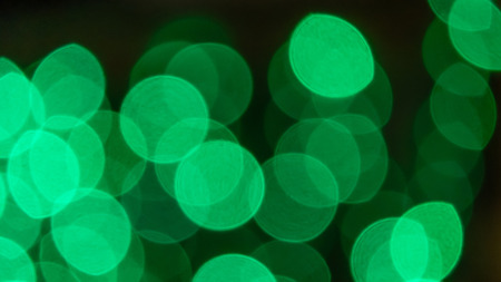 Abstract & Festive background with bokeh defocused lightsの写真素材