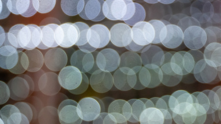 Abstract & Festive background with bokeh defocused lightsの写真素材