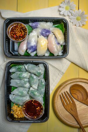 steamed chives dumplings served with spicy chili sauce , asian style cuisineの写真素材