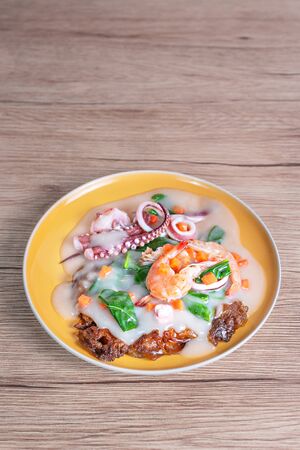 seafood and noodles in a creamy sauce , asian style cuisineの写真素材