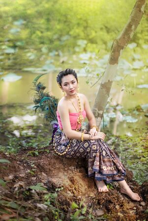 Portrait of beautiful woman in traditional asian dressesの写真素材