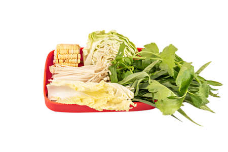 fresh vegetables and vermicelli in plate on white backgroundの写真素材