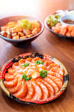 salmon fish fillet with roe and vegetables, sashimi  , japanese style seafood dishesの写真素材