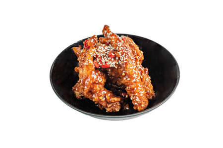crispy fried feet chicken with chili sauce on white backgroundの写真素材