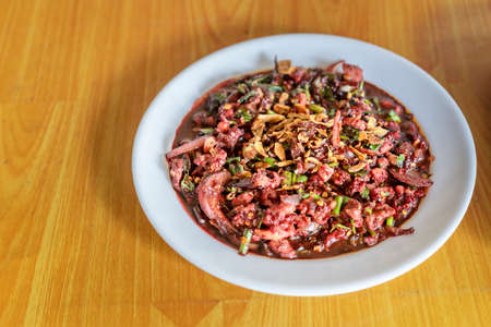 spicy minced meat with mixed vegetables on dishの写真素材