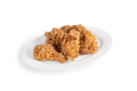 deep fried chicken  on dish over white backgroundの写真素材
