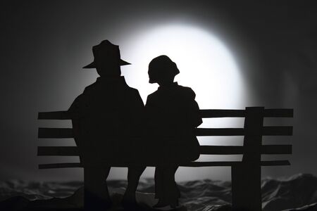 Lover on the bench rocky groundの写真素材