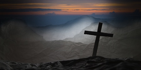 Paper art show a cross on the mountain backgroundの写真素材