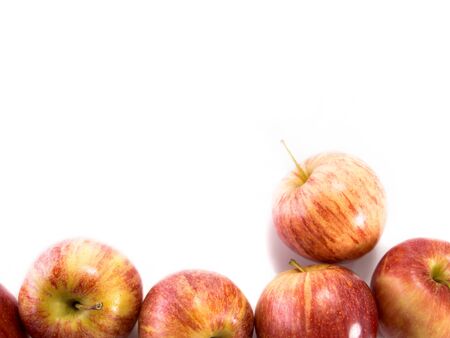Isolated red gala apples on white backgroundの写真素材