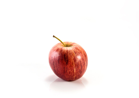 Isolated red gala apples on white backgroundの写真素材