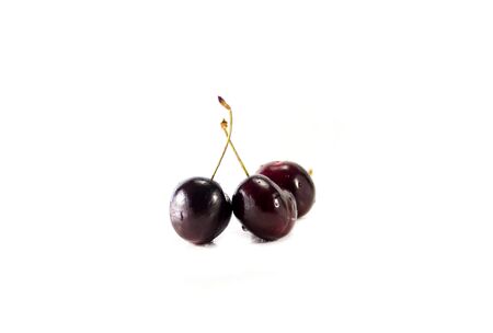 Isolated cherries on the white backgroundの写真素材