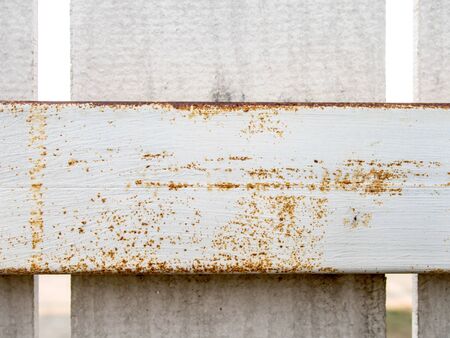 Rusty white fence gate background textureの写真素材