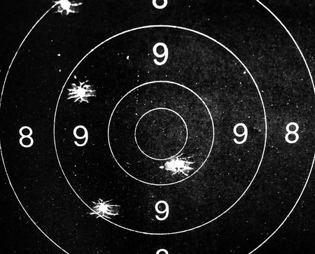 Bullet holes on the score boardの写真素材