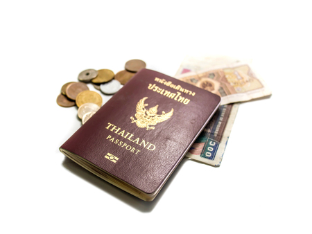Isolated passport banknotes and coins of asian countryの写真素材