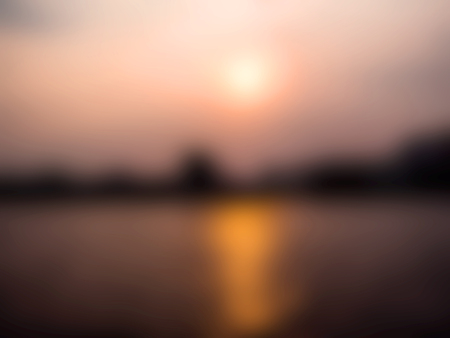 Blur sunset over the river backgroundの写真素材
