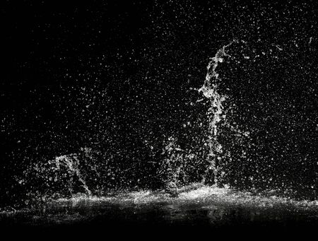 water splash on black backgroundの写真素材