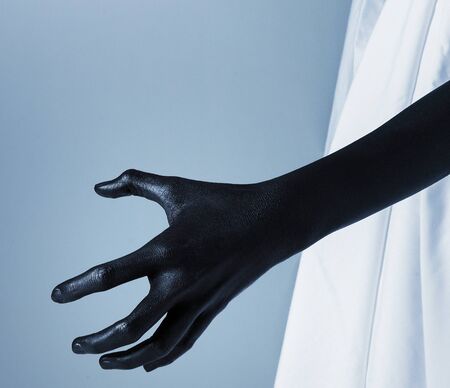 Scary blackhand on white backgroundの写真素材