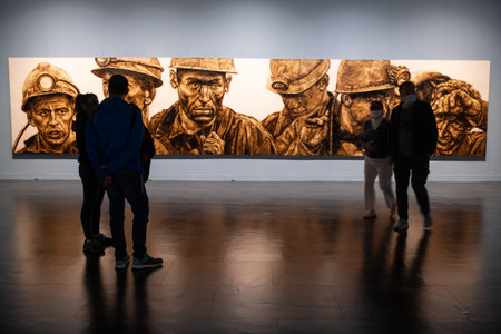 Malaga, Spain, December 2020, Russian Museum. During the Covid 19 Pandemic woman in museum watching an exhibition during the covid pandemic in december 2020のeditorial素材