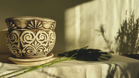 Home decor with a white earthenware vase and green plant. Living room decoration. style, design . High quality photoの写真素材