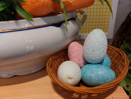 Easter eggs pink, blue and white color photo close up., with vegetable. Happy Easter.の写真素材