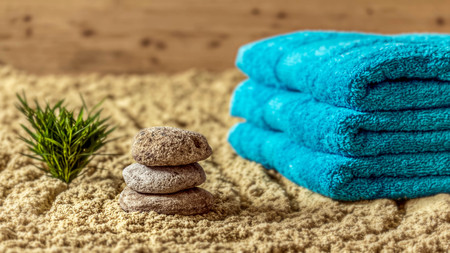 Wellness sauna towels, bamboo and stones