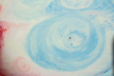 Abstract swirls of acrylic paints