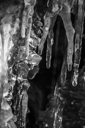 Crystal clear icicles in close upの写真素材