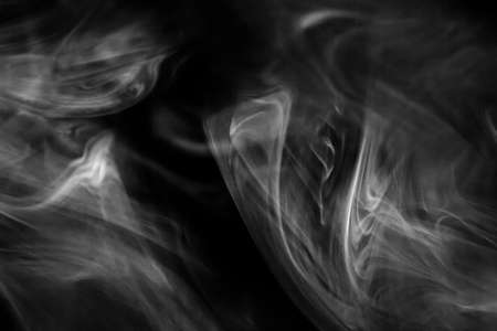 Ornate Smoke Fog on Black Backgroundの写真素材