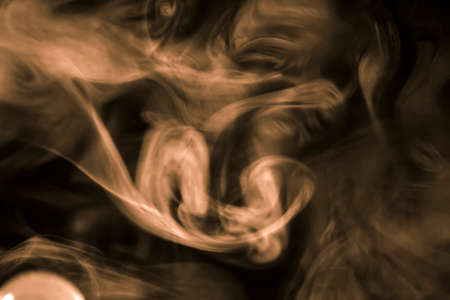 Ornate Smoke Fog on Black Backgroundの写真素材