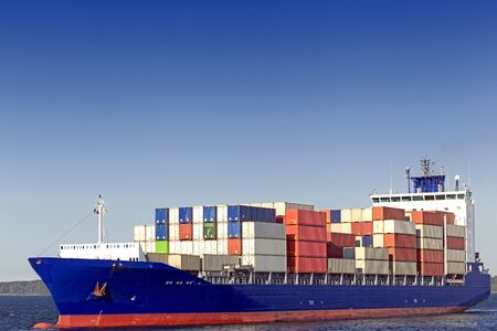 Container ship at the Kiel Canal, Kiel, Germany