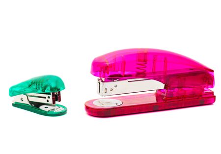 Big red and small green glass staplersの写真素材