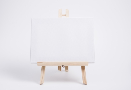 Image shows a white canvas on easelの写真素材