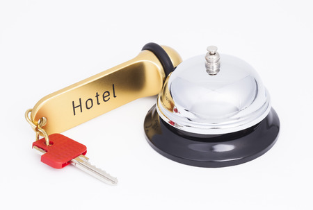 Hotel key and reception bellの写真素材