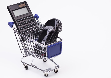  Sports car calculator and cart isolated on white backgroundの写真素材