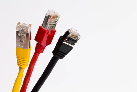 Image shows three Colored Network Cables in black, Red, Yellow