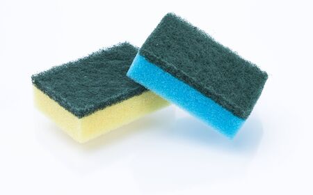 Image shows two colored sponges isolated on whiteの写真素材
