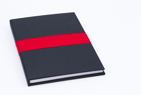 Image shows a notebook isolated on white backgroundの写真素材