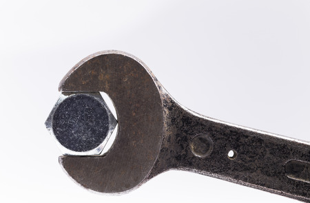 Image shows a construction screw with an old wrenchの写真素材