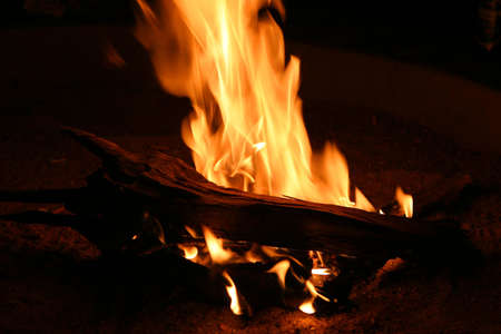 warming campfire giving light after sunset