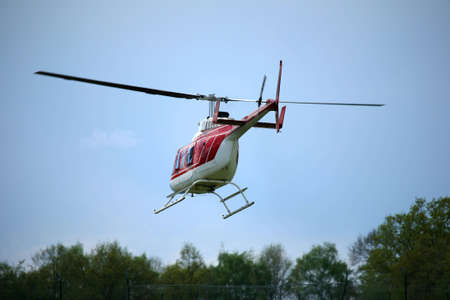 image of a helicopter right after takeoff