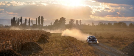 BACAU, ROMANIA - OCTOBER 13 2011: Romulus Preda and  Cristian Baciucu at Bacau Rally 2011 driving a...