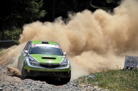 SIBIU, ROMANIA - JULY 20 2012: Simone Tempestini/Baggio Lucio with a Subaru N14 at IRC Sibu Rally 2012のeditorial素材