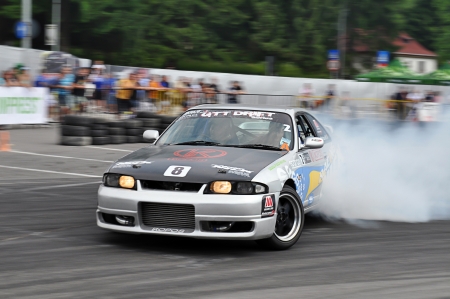 POIANA BRASOV, ROMANIA - JUNE 18 2011: Nissan Skyline piloted by Marius Mitrache at Poiana Brasov 2011のeditorial素材
