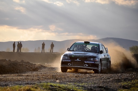 BACAU, ROMANIA - OCTOBER 13 2011: Titi Aur/Borbely Karoly - Mitsubishi EVO IX - Bacau Rally 2011のeditorial素材