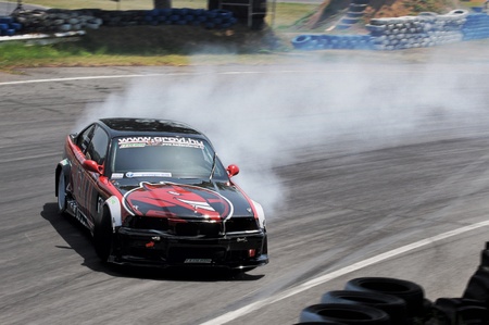 MARIAPOCS, HUNGARY - AUGUST 8 2012: Grozinger Zsolt drifting at Mariapocs racing circuit 2012