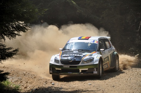 SIBIU, ROMANIA - JULY 20 2012: Girtofan Dan/Berghea Adrian - Skoda Fabia S2000 - IRC Rally Sibiu 2012のeditorial素材