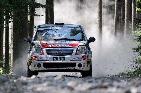 BRASOV, ROMANIA - AUGUST 28 2010: Danny Daniel/Avram - Citroen C2R2 Max - Rally Tara Barsei 2010のeditorial素材