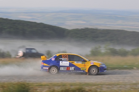 SIBIU, ROMANIA - JULY 15 2010: Klein Marius/Limbach Jorn - Mitsubishi Lancer EVO 7 - Sibiu Rally 2010のeditorial素材