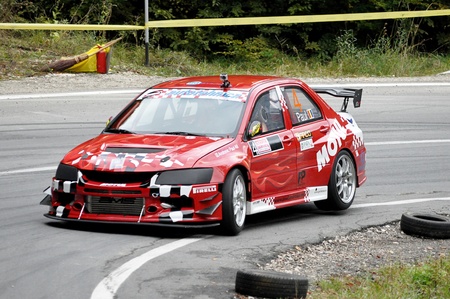 RASNOV, ROMANIA - SEPTEMBER 30 2010: Andronic Paul - Mitsubishi Lancer EVO 9 - Trophy Rasnov 2010のeditorial素材