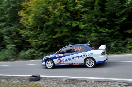 RASNOV, ROMANIA - SEPTEMBER 30 2010: Iliescu Sorin - Mitsubishi Lancer EVO 9 - Trophy Rasnov 2010のeditorial素材